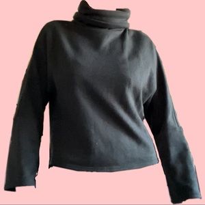 Very dark green warm turtle neck sweater